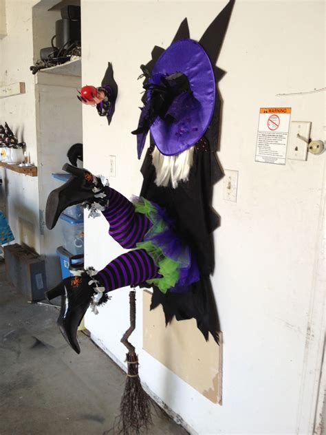 Witch on a flying broom decoration